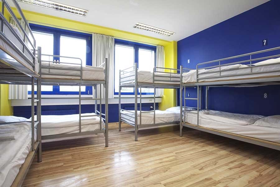 Bed in 8-bed Dorm –&#160;Shared Bathrooms